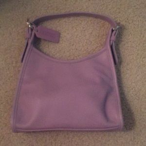 Never before worn coach bag in lavender!